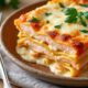 découvrez notre recette de lasagnes au saumon, fondantes et gourmandes, sublimées par une sauce béchamel onctueuse. un plat savoureux et facile à préparer pour régaler toute la famille.